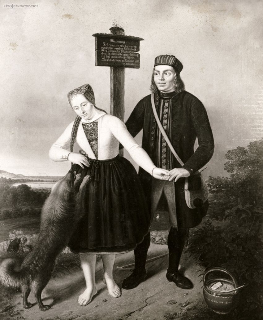 Obraz Augusta Ferdinanda  Hauptnera z 1845 r. przedstawiający pastucha owiec i dziewczynę wiejską w ubiorze codziennym, ze zbiorów Muzeum Narodowego w Szczecinie

Czapka męska, tzw. <em>biret</em> to okrągłe lub kwadratowe nakrycie głowy, sztywne bez daszka, wzorowane na nakryciu głowy duchownych protestanckich, sędziów, profesorów, członków senatu uniwersyteckiego.